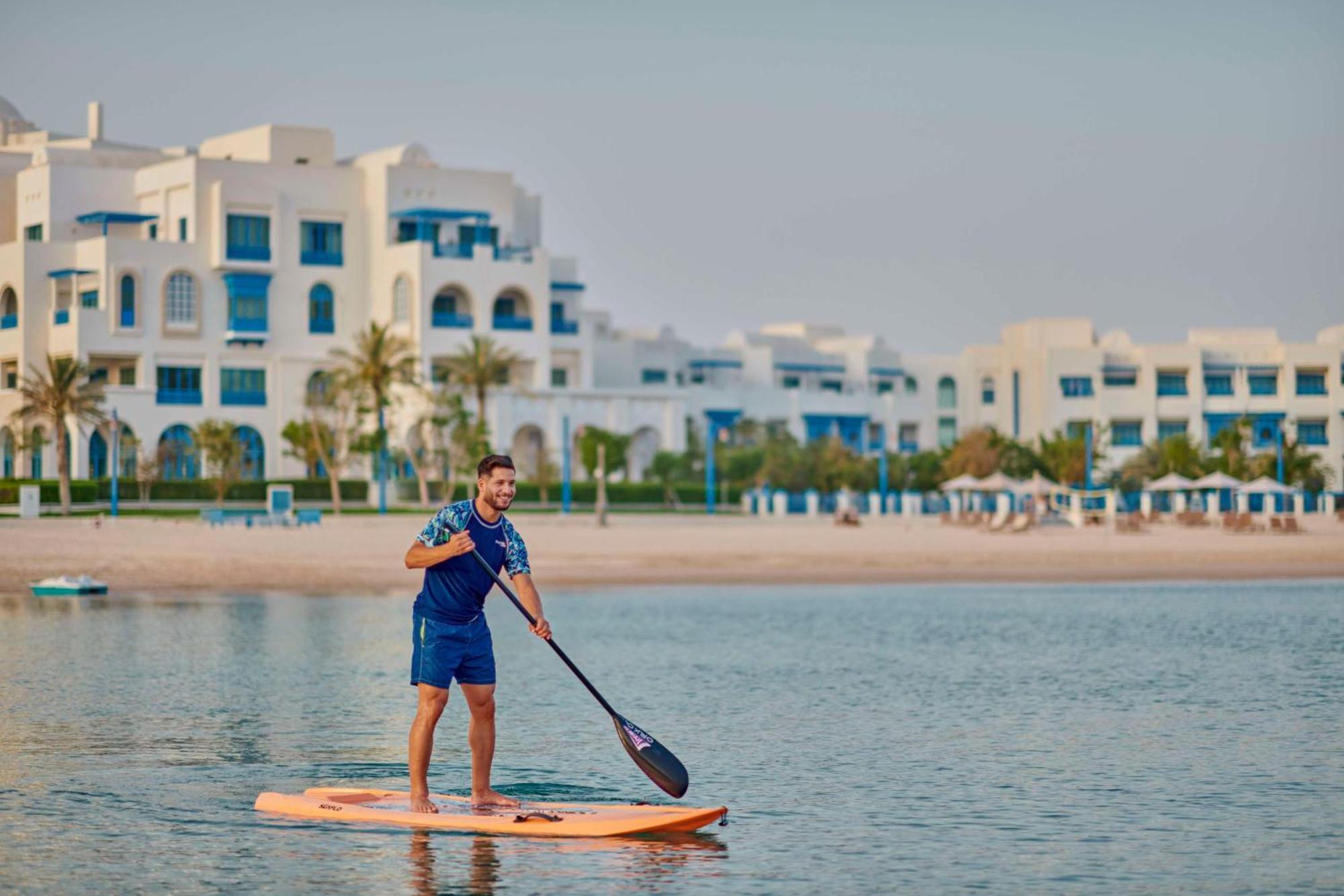 Hilton Salwa Beach Resort And Villas Abu Samra Eksteriør bilde Stand Up Paddle Boarding at Al Habtoor Polo & Equestrian Club